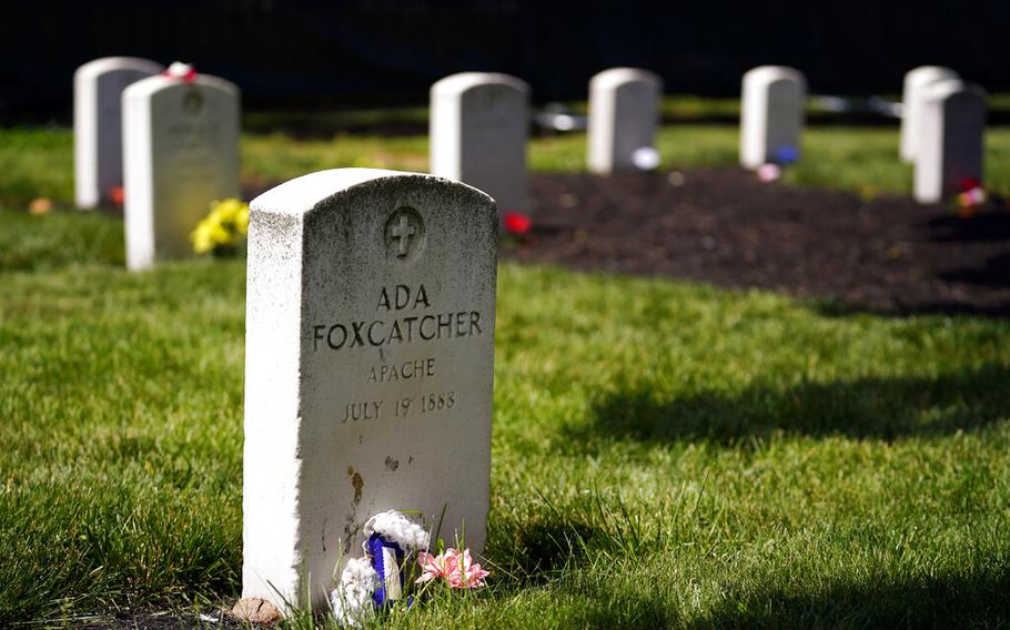 A headstone is seen at the cemetery of the U.S. Army’s Carlisle Barracks, Friday, June 10, 2022, in Carlisle, Pa. The Army is continuing a multi-phase project to disinter the remains of indigenous children who died more than a century ago while attending a government-run boarding school at the site and reunite them with their families.