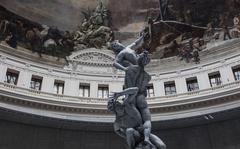 A replica of the 16th-century sculptor Giambologna's 'Rape of the Sabine Women', one of nine wax figures that comprise Urs Fischer's 2011-2020 work "Untitled" at the "Ouverture" exhibition in the Boerse De Commerce in Paris on May 14, 2021. MUST CREDIT: Bloomberg photo by Jeanne Frank.