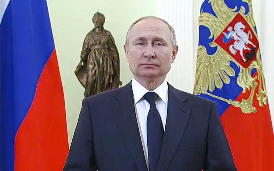 A video screen grab shows Russian President Vladimir Putin attending an event in Moscow, Russia, on March 8, 2022.