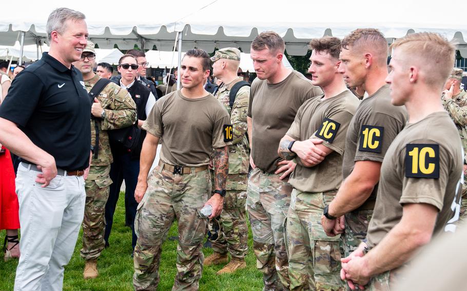 Dan Driscoll talks with soldiers.