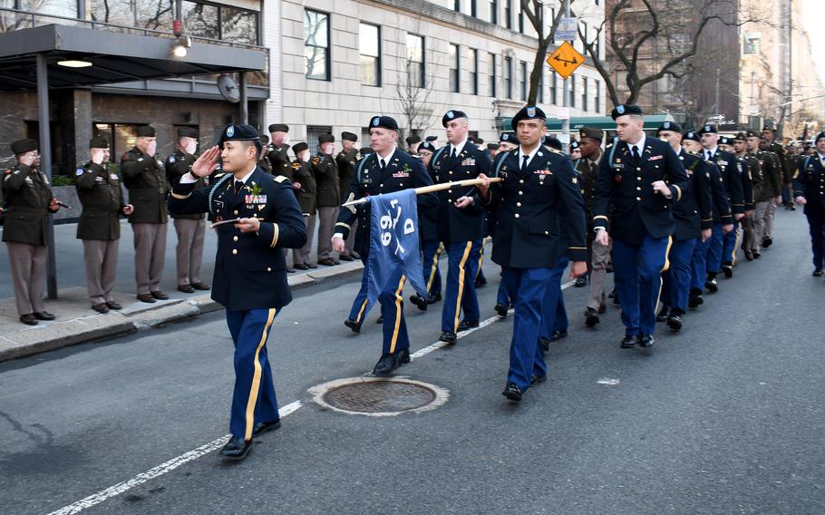 Soldiers with the New York National Guard’s 1st Battalion, 69th Infantry Regiment, 27th Infantry Brigade Combat Team, 42nd Infantry Division, perform an “eyes right,” a military courtesy designed to render honors to those being passed, during the annual New York City St. Patrick’s Day Parade, Saturday, March 16, 2024.
