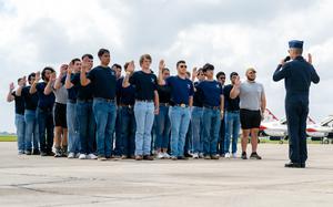 Air and Space Force recruits take the oath of enlistment during The Great Texas Airshow at Joint Base San Antonio-Randolph on April 6, 2024.
