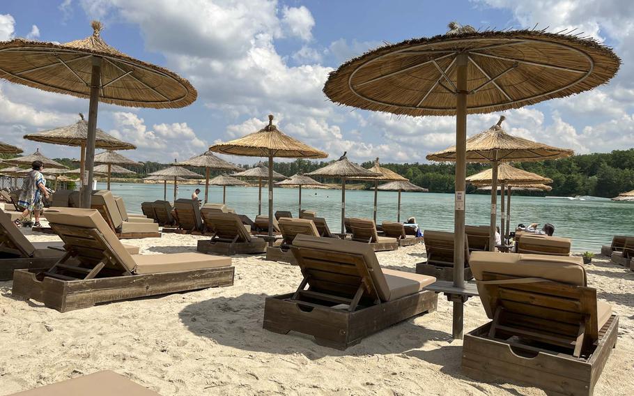 A view of the beach from the Chamaeleon am See beach club at Pinta Beach on the Raunheimer Waldsee in Germany on May 20, 2024. The club area offers food, drink and hookah table service.