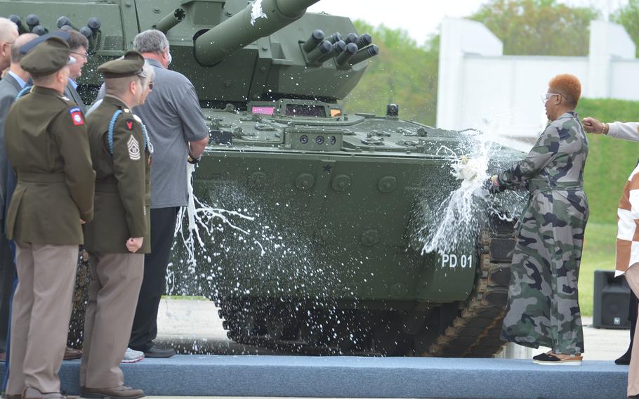 Michael Booker, Pvt. Robert D. Booker’s eldest nephew, and Kimberly Talley-Armstead, the sister of Staff Sgt. Stevon Booker, christened the Army’s new combat vehicle Thursday, April 18, 2024, during a dedication ceremony for the M10 Booker. 