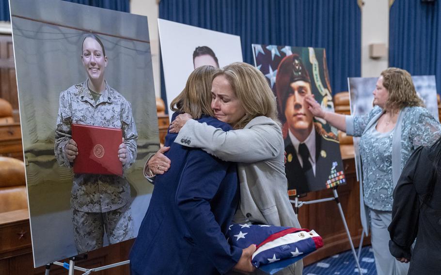 Christy Shamblin, left, mother-in-law of Marine Corps Sgt. Nicole L. Gee and an Abbey Gate Gold Star family member, gets a hug from Rep. Madeleine Dean, D-Pa., who presented her with a flag flown over the U.S. Capitol on Aug. 26, 2023, after a House Foreign Affairs Committee roundtable discussion Tuesday, Aug. 29, 2023, on Capitol Hill in Washington. Thirteen U.S. service members were killed, and 45 more wounded, in the terrorist attack at the Hamid Karzai International Airport’s Abbey Gate in Kabul, Afghanistan, on Aug. 26, 2021. 