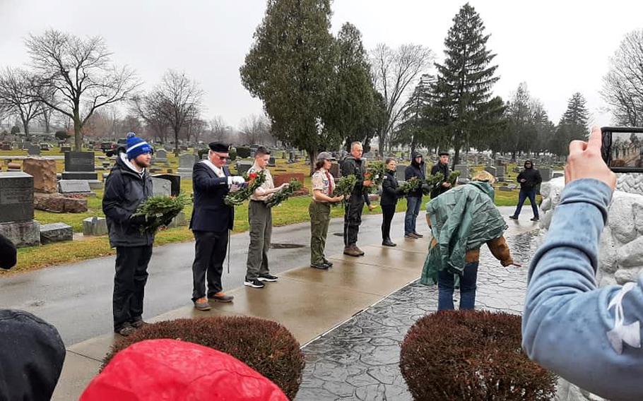 Volunteers prepare to lay wreaths at Maple Grove Cemetery in West Virginia in 2021. The Wreaths Across America Day ceremony is scheduled for 1 p.m. Dec. 17 at Maple Grove Cemetery, and will be one of 3,100 similar wreath-laying ceremonies nationwide to be held that day.