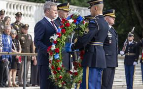 Secretary of the Army Dan Driscoll, left, Army Chief of Staff Gen. Randy George, Sgt. Maj. of the Army Michael Weimer, and Maj. Gen. Trevor Bredenkamp, commanding general of the Joint Task ForceÐNational Capital Region, lay a wreath at the Tomb of the Unknown Soldier on Saturday, June 14, 2025, in Arlington, Va., during an Army Full Honor Wreath Ceremony marking the U.S. ArmyÕs 250th birthday. (Eric Kayne/Stars and Stripes)