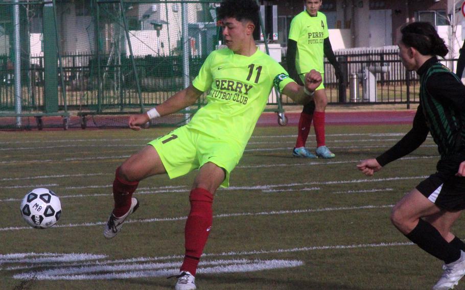 Matthew C. Perry's Ren Spinosi readies to boot the ball against Robert D. Edgren during Friday's Perry Cup boys soccer match. The Samurai won 3-0.