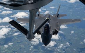 A U.S. Air Force F-35A Lightning II from the 48th Fighter Wing, RAF Lakenheath, England, approaches a U.S. Air Force KC-135 Stratotanker from the 100th Air Refueling Wing, RAF Mildenhall, England, for fuel during exercise Atlantic Trident 25 over Finland, June 26, 2025. Atlantic Trident 25 is a Finnish Air Force-hosted, operational and tactical-level field training exercise designed to strengthen interoperability and cohesion with NATO allied forces. (U.S. Air Force photo by Senior Airman Christopher Campbell)