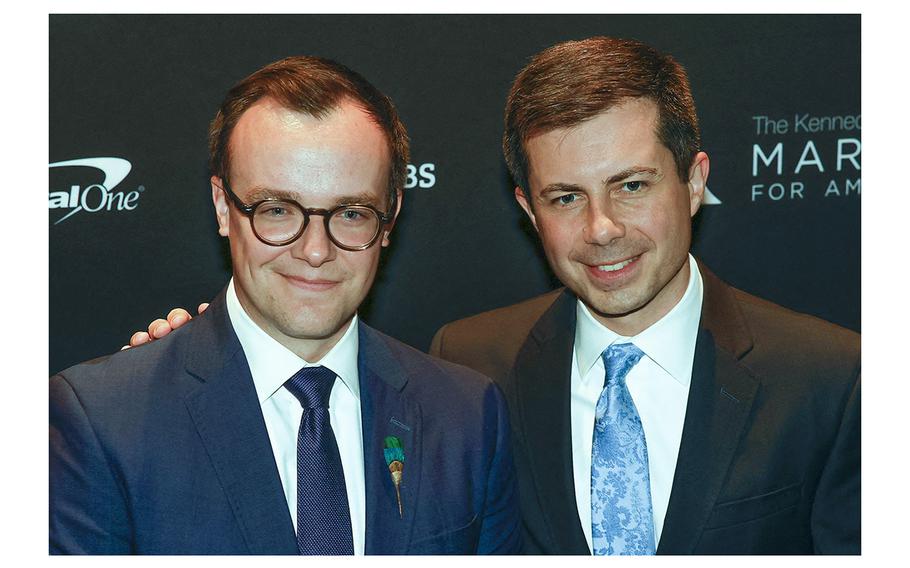 U.S. Secretary of Transportation Pete Buttigieg, right, and his husband Chasten Buttigieg arrive for an event at the Kennedy Center in Washington, D.C., on April 24, 2022. Chasten Buttigieg slammed Fox News anchor Tucker Carlson for Carlson’s disparaging remarks about Pete Buttigieg, saying the transportation secretary at one point lied about being gay. 