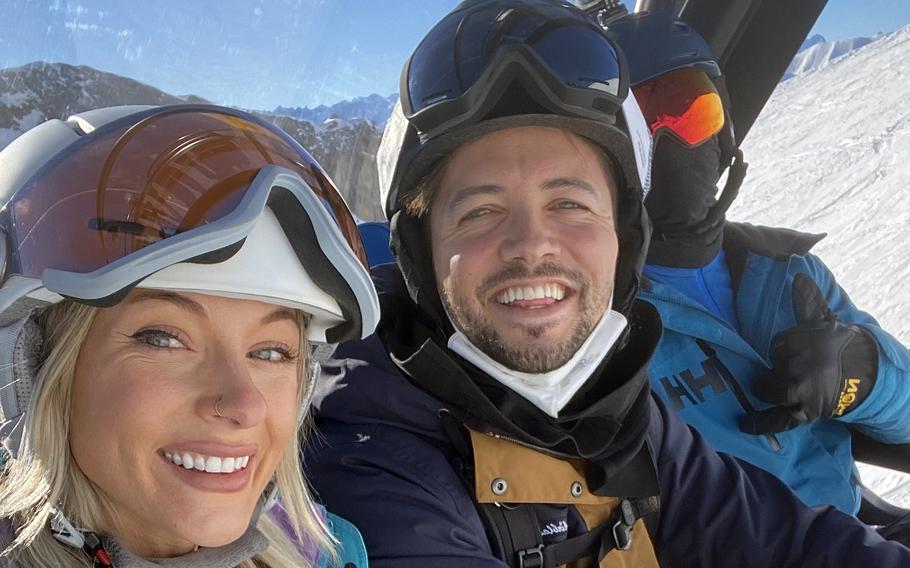 Tine Kirby, Kiefer Jones, center, and the couples’ friend, Kaleb Cross, ride the ski lift at Ischgl ski resort in Austria’s eastern Alps on Jan. 14, 2022. It was one of the last photos the couple took before Jones suffered a traumatic brain injury on the slopes while snowboarding. 