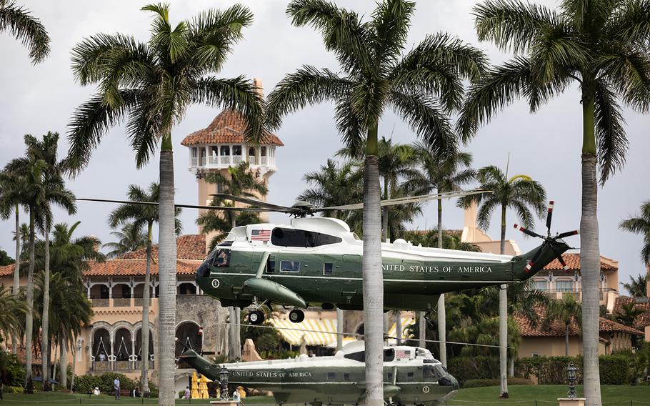 Former President Donald J. Trump aboard Marine One lands back at Mar-a-Lago in Palm Beach, Fla. as an escort helicopter hovers Friday, March 29, 2019. A Trump employee has told federal agents about moving boxes of documents at Mar-a-Lago at the specific direction of the former president.