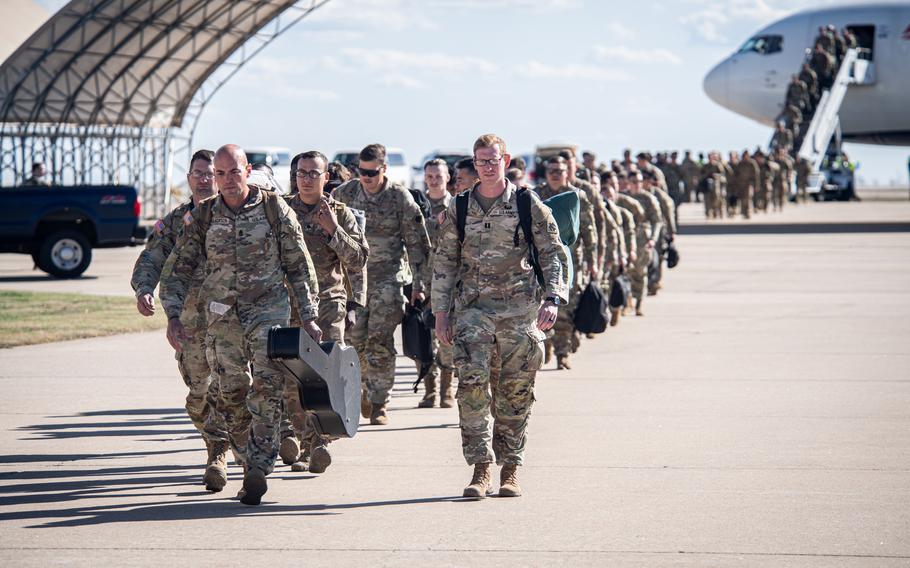 Members of Task Force Tomahawk arrive at Will Rogers Air National Guard Base in Oklahoma City, Friday, Feb. 23, 2024. Task Force Tomahawk returned from a nine-month deployment in the Horn of Africa.