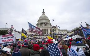 FILE - Insurrections loyal to President Donald Trump rally at the U.S. Capitol in Washington on Jan. 6, 2021. A felony case stemming from the U.S. Capitol riot appears to have been resolved in secret, with the man released from federal custody this week despite no public record of a conviction or sentencing. Pennsylvania resident Samuel Lazar was arrested in July 2021 and had been jailed since then on charges in the Jan. 6 insurrection. There's no public record of a conviction or a sentence in Lazar’s court docket. But the Bureau of Prisons tells The Associated Press that Lazar was sentenced in March to 30 months behind bars for assaulting or resisting a federal officer. (AP Photo/Jose Luis Magana, File)