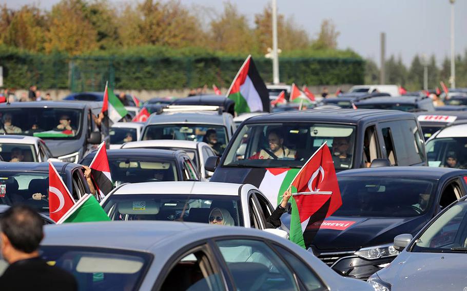 In a photo from a social media post, protesters head to Incirlik Air Base in Turkey to demonstrate against American support for Israel. The U.S. military said it is boosting security at Incirlik in anticipation of protests this weekend.