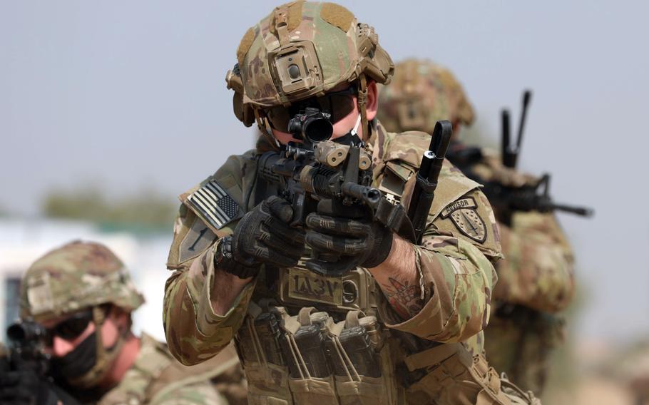 Staff Sgt. Brandon Williams of the 1st Battalion, 5th Security Force Assistance Brigade leads a team training small-unit tactics at Mahajan Field Firing Range in Rajasthan, India, Feb. 9, 2021. 