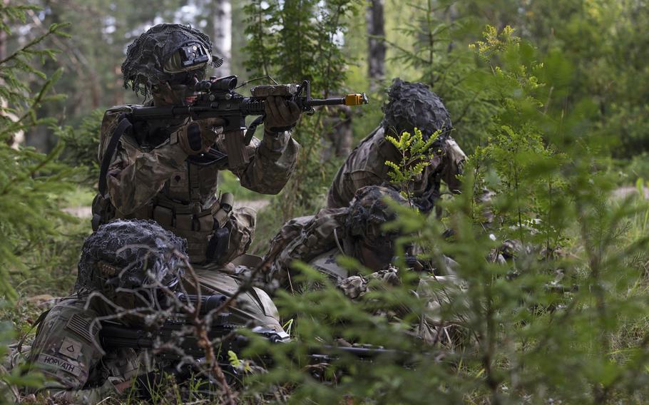 Soldiers from the 101st Airborne Division return fire during a platoon-level exercise at Nurispalu Training Area, Estonia, June 25, 2023. 