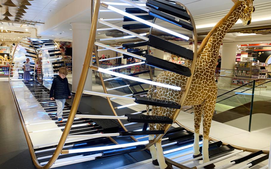 A piano installation in the Selfridges store on Oxford Street in London. 