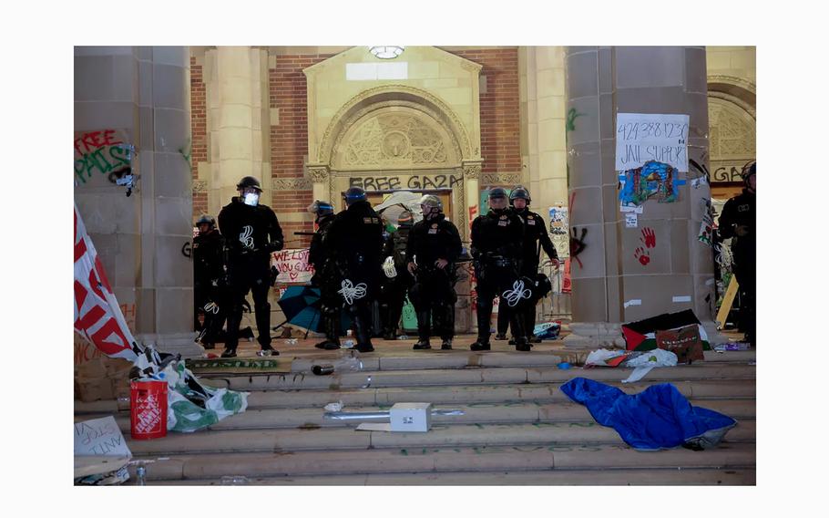 Police at one of the buildings on the UCLA campus Thursday, May 2, 2024. 