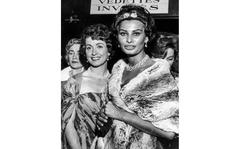 Red Grandy/Stars and Stripes
Cannes, France, May, 1958: Actresses Sophia Loren, right, and Daniele Darrieux arrive at a Cannes Film Festival screening.