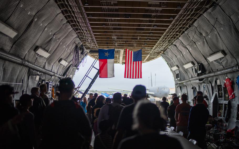 The Great Texas Airshow visitors tour a static C-5 Galaxy, Saturday, April 6, 2024, at Joint Base San Antonio-Randolph, Texas. The C-5 is a strategic transport aircraft and is the largest aircraft in the Air Force inventory. Its primary mission is to transport cargo and personnel for the Department of Defense. 