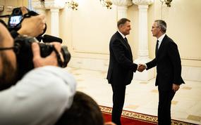 NATO Secretary-General Jens Stoltenberg meets with Romanian President Klaus Iohannis in Bucharest, Romania, on Nov. 28, 2022. Iohannis, who is hosting a meeting of allied foreign ministers, told reporters that “much more concrete and courageous” decisions are needed on how to reinforce his country and others in the region, in light of Russia’s war on Ukraine.