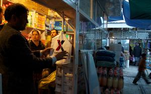 Kabul, Afghanistan, Apr. 21, 2012: An Afghan shop owner straightens out a stack of Exchange-brand plastic bags hanging in his stall in Kabul's so-called "Bush Market," or "Obama Bazaar". The bags were meant for American military exchange stores in Afghanistan, but, like many other supplies, ended up in the bazaar, a black market for stolen U.S. goods.

Read Stars and Stripes' 2012 story on the thriving black market bazaar here. https://www.stripes.com/news/afghan-market-flourishing-with-coalition-goods-1.178460

META TAGS: Afghanistan; black market; corruption; Operation Enduring Freedom; black market goods; 