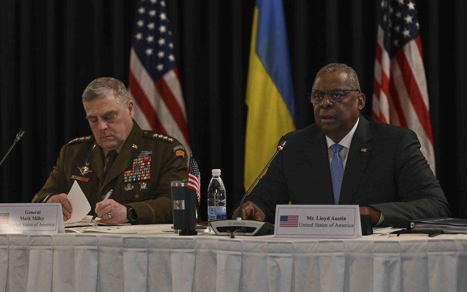 U.S. Army Gen. Mark Milley, left, and U.S. Defense Secretary Lloyd Austin during opening remarks on military cooperation during the Ukraine Defense Contact Group meeting Sept. 19, 2023, at Ramstein Air Base in Germany.