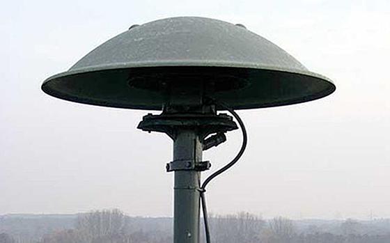 A photo of an outdoor warning siren.