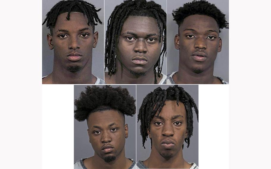 Suspects are at top from left, Tyreese McCullough, 17; Wilson LaMar Hill Jr, 20; and Travis McCullough, 16, and at bottom are from left, Johnny Letron Brown, 20; and Willie George Brown Jr., 19. The five have been arrested and charged with reckless murder in connection with a shooting that killed four young people at a Sweet Sixteen birthday party in rural Alabama, investigators announced on April 19, 2023. A 15-year-old who has not been publicly identified has also been charged with reckless murder in the case.