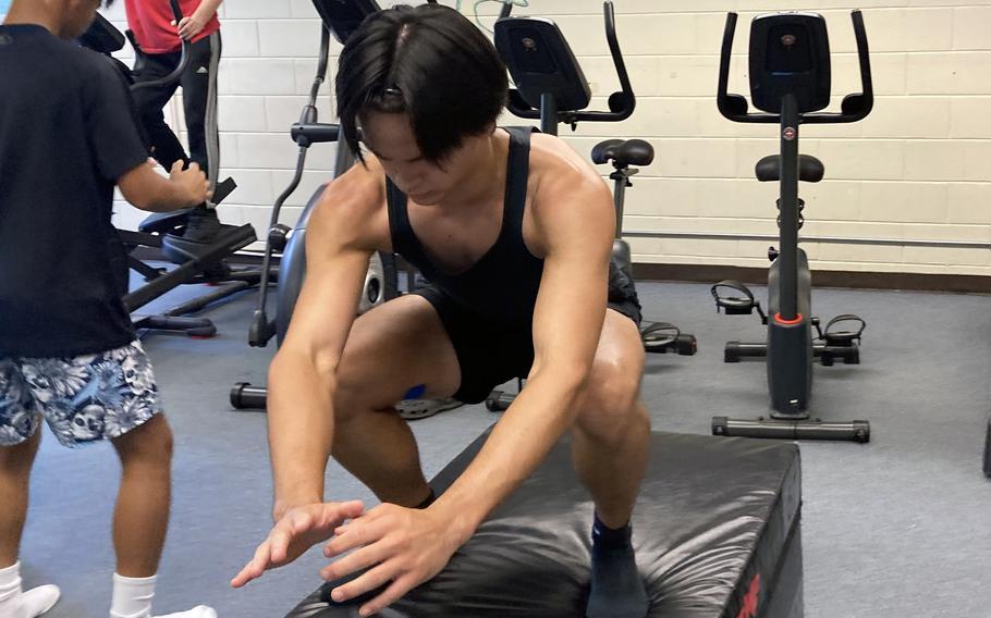 Ryan Hater works on his leg muscles.
