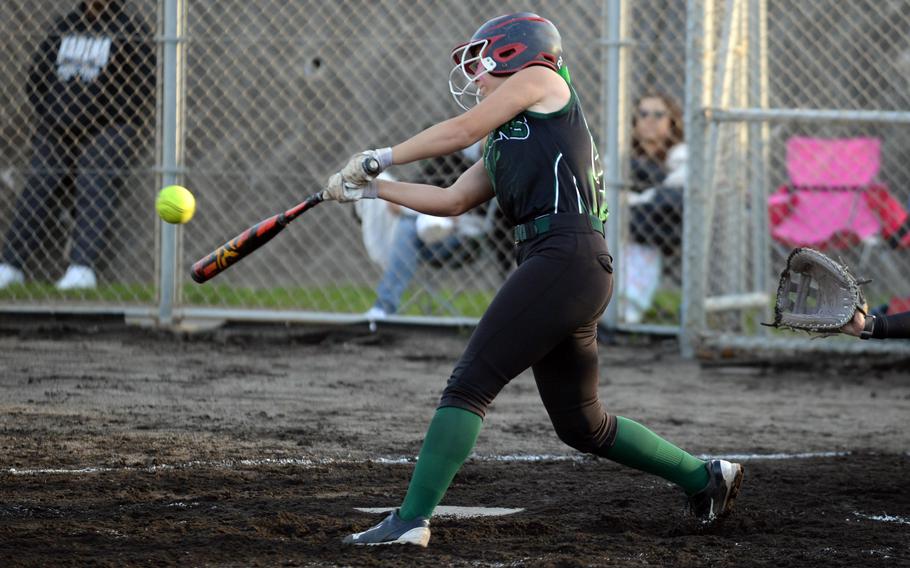 Kubasaki's Taylor Tobin connects for a two-run single against Kadena during Tuesday's DODEA-Okinawa softball game. The Panthers won 8-2 and took a 2-0 season-series lead.