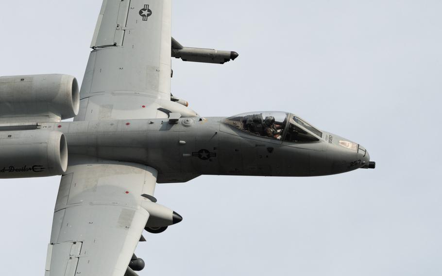 An airman with the 127th Wing based at Selfridge Air National Guard Base, Mich., flies an A-10 Thunderbolt II aircraft above the Steel Gate air-to-ground range, part of Camp Grayling, Mich., on Aug. 6, 2025, during the biannual Northern Strike military exercise.