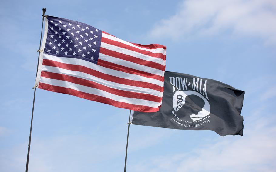 U.S. and POW/MIA flags fly together. Veterans in Cheshire, Conn., are protesting the removal of the POW/MIA flag from town property, a decision the town said was made in accordance with its flag policy.