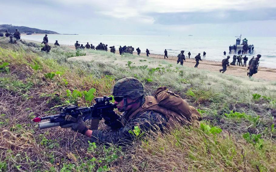Marines secure Kings Beach near the Australian town of Bowen during an amphibious drill that was part of the monthlong Talisman Sabre exercise, July 22, 2019.