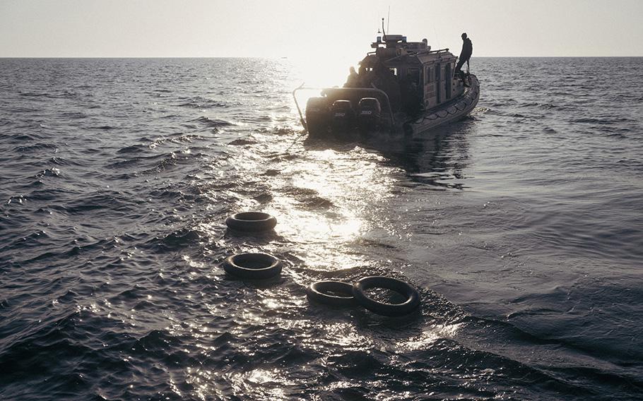 Life buoys float off the coast of Sfax, Tunisia, on May 27, 2023, near the area where the Tunisian coast guard sank a migrant boat to prevent smugglers from reusing it. 