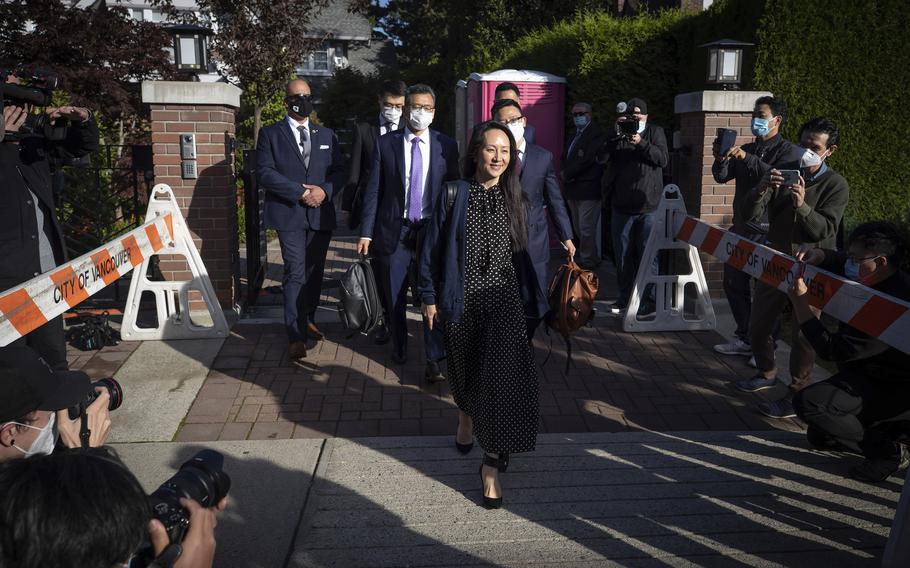Meng Wanzhou, chief financial officer of Huawei Technologies, leaves her home in Vancouver, on Friday, Sept. 24, 2021. Wanzhou has resolved criminal charges against her as part of a deal with the U.S. Justice Department that could pave the way for her to return to China and that concludes a case that roiled relations between Washington and Beijing. 