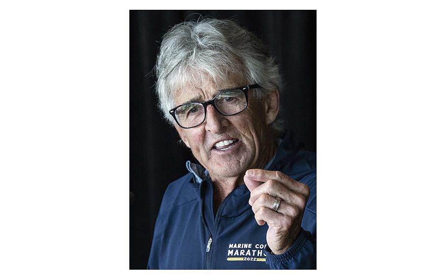 Olympic marathon champion Frank Shorter speaks at Friday's Marine Corps Marathon press conference in Arlington, Va.