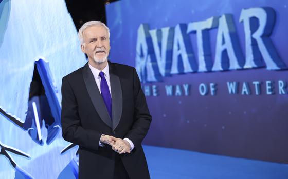 Director James Cameron poses for photographers upon his arrival at the world premiere of the film 'Avatar: The Way of Water' in London, Dec. 6. 