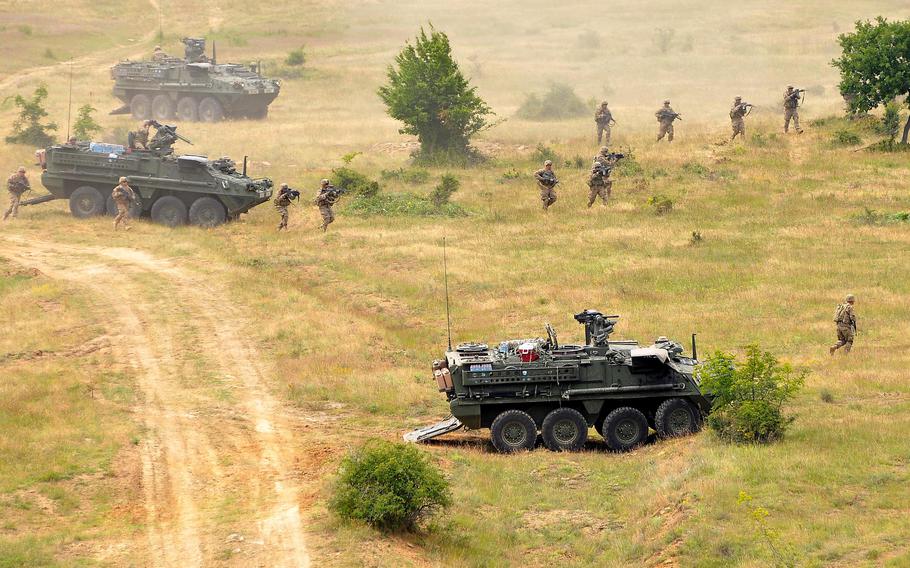 Soldiers of the 2nd Cavalry Regiment out of Vilseck, Germany, dismount from their Stryker vehicles during the live-fire exercise at Novo Selo Training Area, Bulgaria, in 2015. Defense Secretary Lloyd Austin said Feb. 17, 2022, that a company of troops from the 2nd Cavalry Regiment will travel to Bulgaria to train with allies there. 