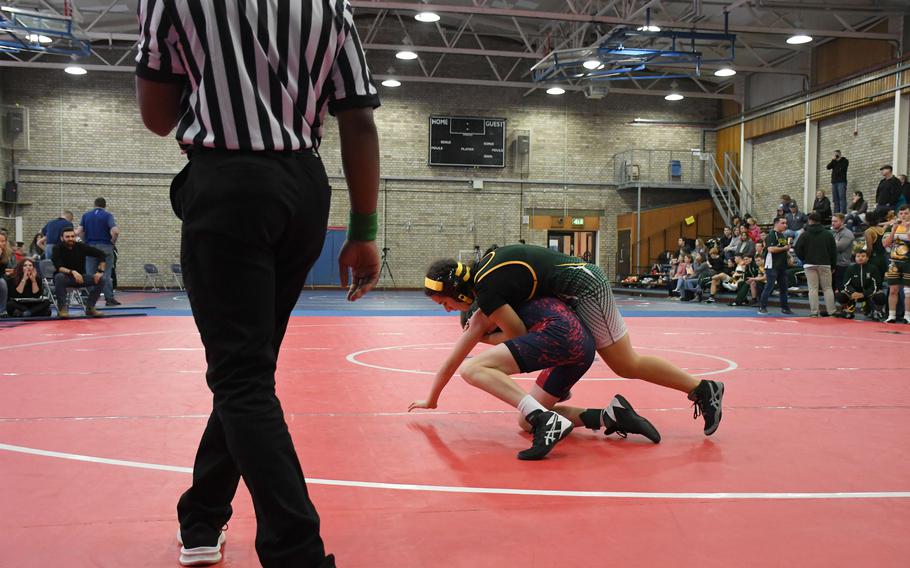 SHAPE's Nicky Arias grabs control of her opponent at 106 pounds Saturday, Dec. 3, 2022 at RAF Lakenheath, England