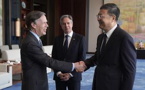 U.S. Secretary of State Antony Blinken, center, watches U.S. Ambassador to China Nicholas Burns, left, shake hands with Shanghai Party Secretary Chen Jining at the Grand Halls, Thursday, April 25, 2024, in Shanghai, China.