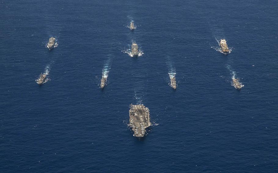 The aircraft carrier USS Ronald Reagan leads its strike group in the Philippine Sea during Valiant Shield 2018. 