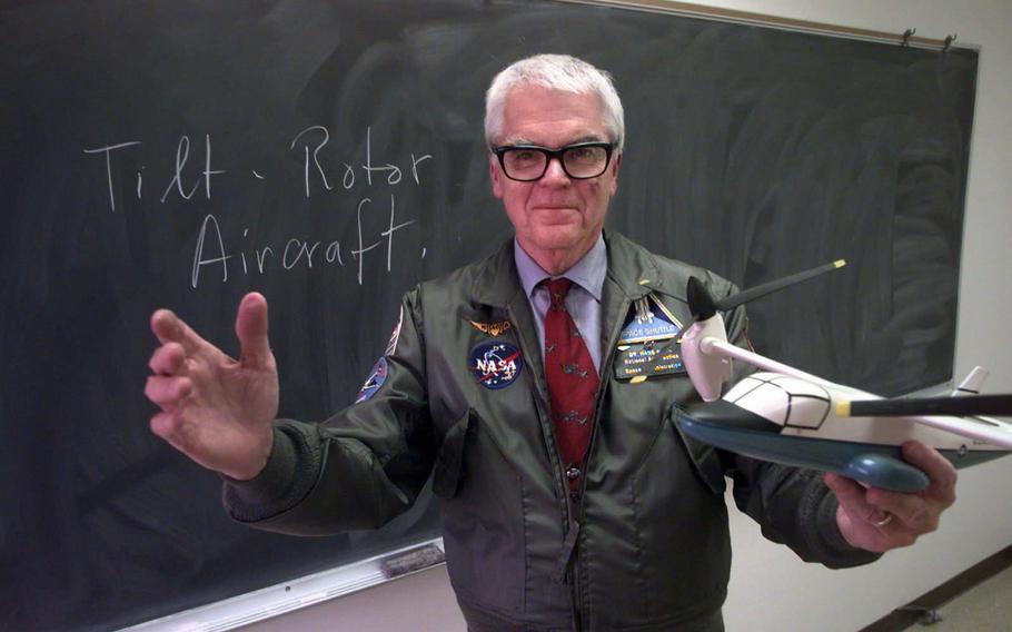 Hans Mark in 1998 with a model of the tiltrotor aircraft that he helped develop. Mark, a University of Texas aerospace engineer and former deputy director of NASA, also served as secretary of the Air Force and UT System chancellor.