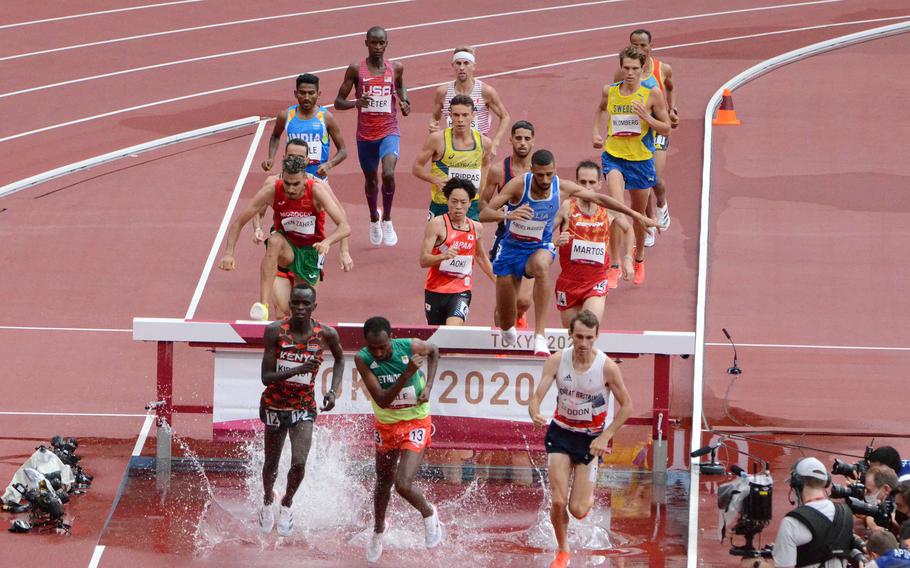 Army Spc. Benard Keter trailed the pack for the first half of his heat in the Olympic men’s 3,000-meter steeplechase at Tokyo’s National Stadium, Friday, July 30, 2021. 