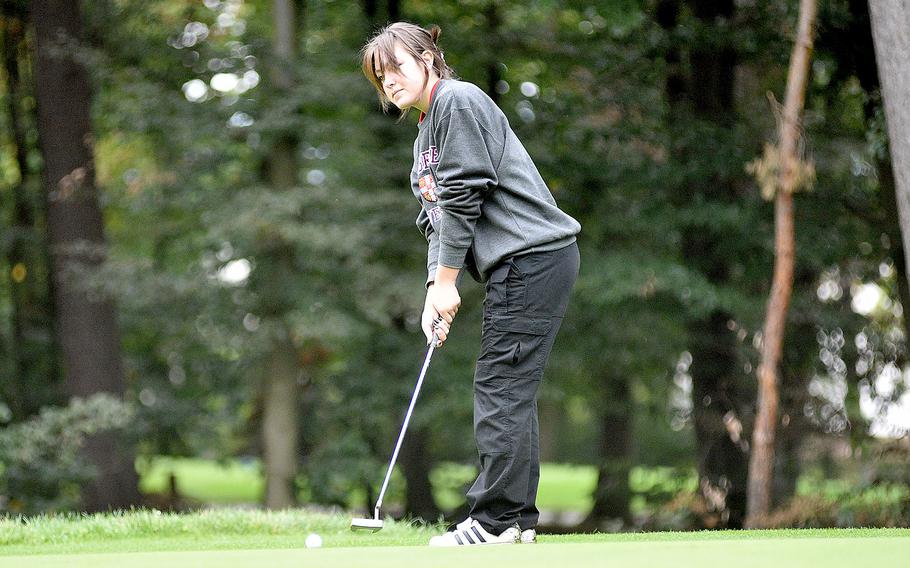 Kaiserslautern's Reigen Pezel putts on the No. 2 green at Woodlawn Golf Course during the first round of the DODEA European golf championships on Oct. 12, 2023, on Ramstein Air Base, Germany.