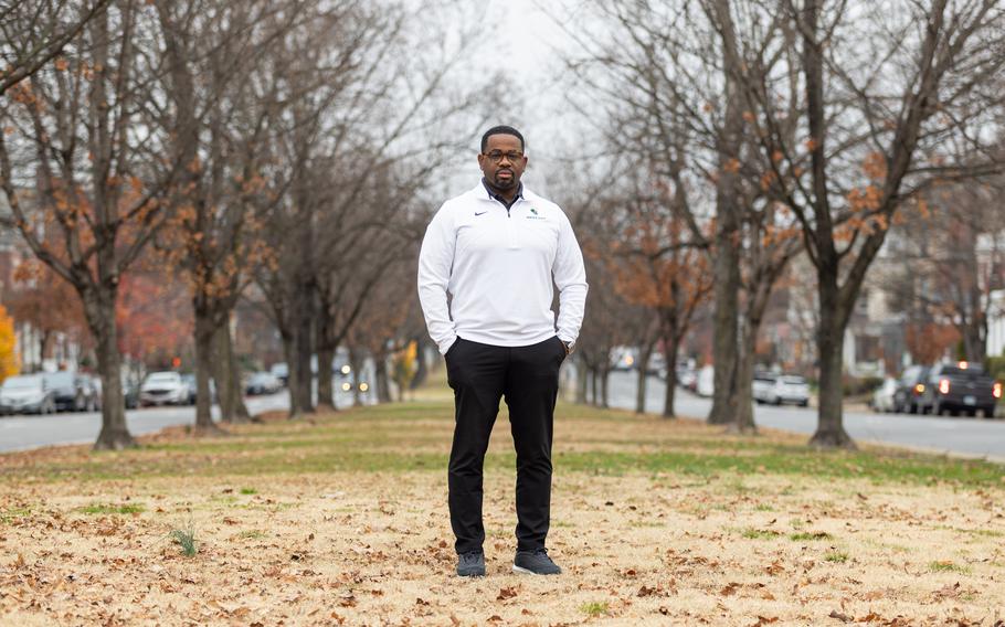 Devon Henry stands near the former site of the Robert E. Lee statue, which his company was hired to remove, on Monument Avenue in Richmond on Dec. 6.