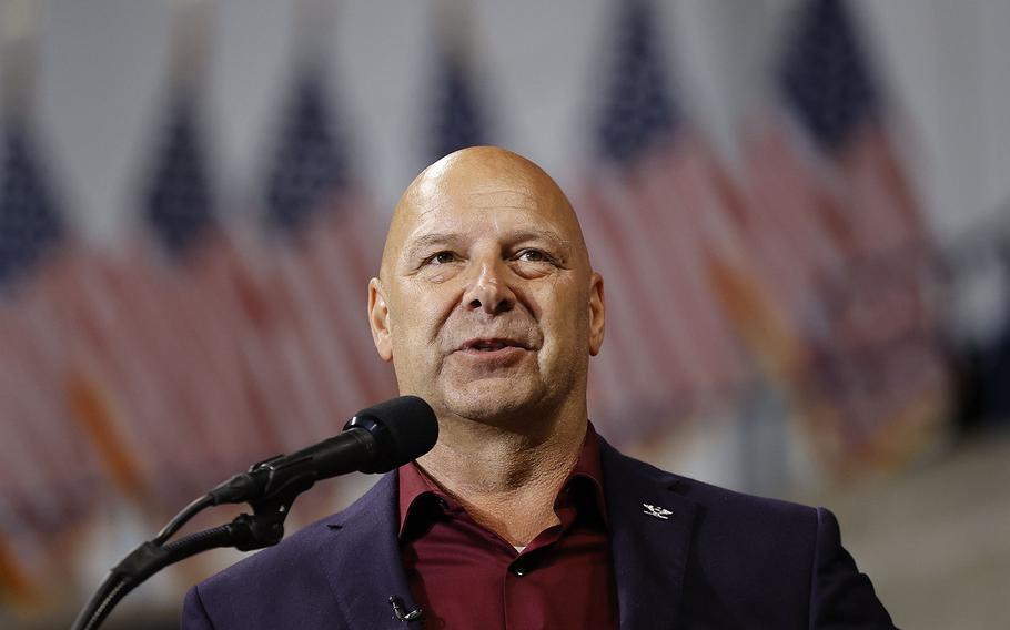 Doug Mastriano talks to supporters during the Save America rally with former President Donald Trump at the Mohegan Sun Arena at Casey Plaza in Wilkes-Barre on Sept. 3, 2022. 