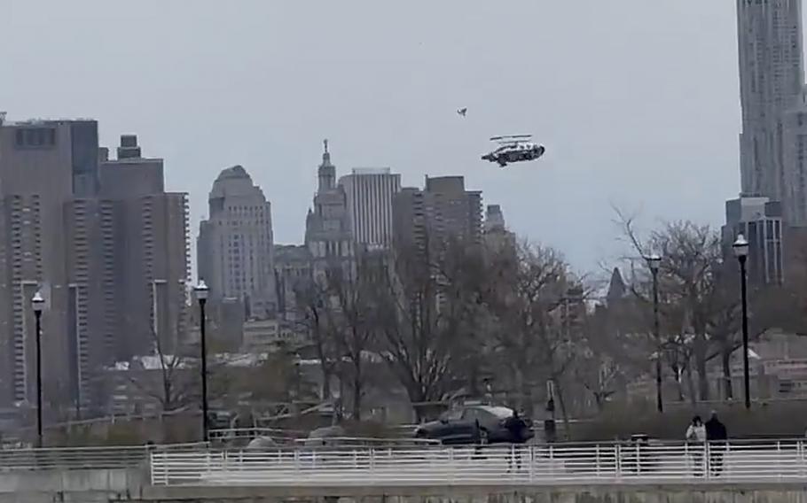 A helicopter falls from the sky into the Hudson River