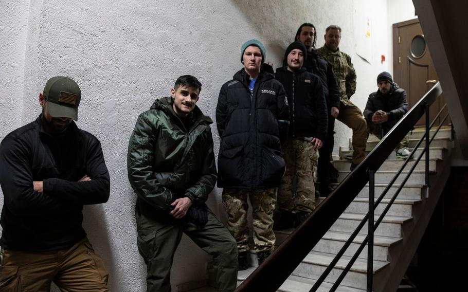 An early group of volunteer fighters gather in Kyiv, including, from left to right, Kelso from Montana, Mehmet from Germany, Adam from California, Driven from Washington State, and Nile and Mike from Sweden. 